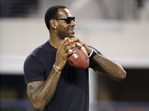 LeBron James practices with former high school football team