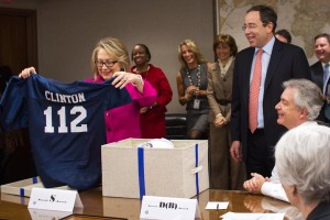 Sec. Clinton with her new 112 jersey--representing the countries visitied during her four-year term.