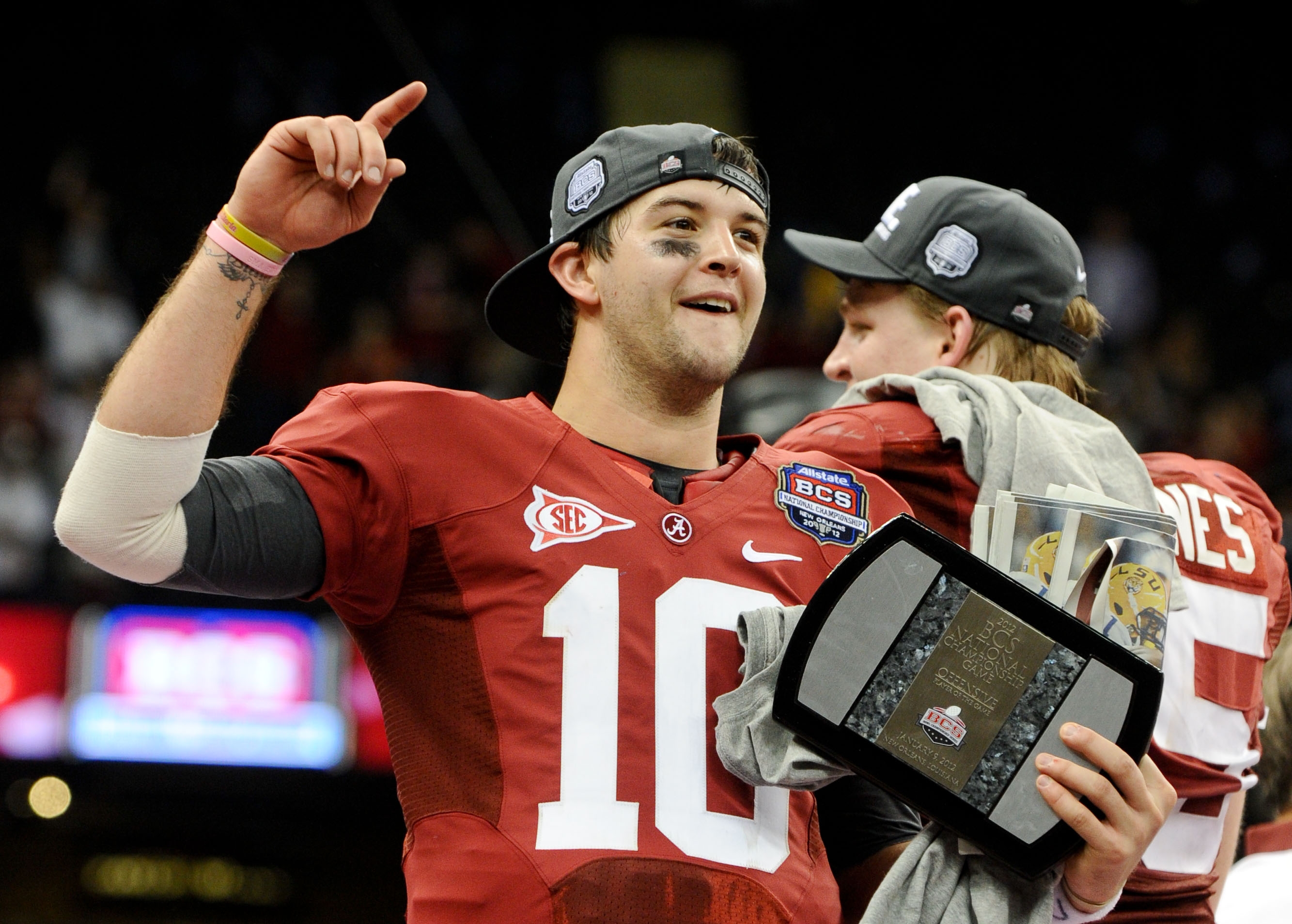 Katherine in an Alabama jersey. A.J. was a quarter back for